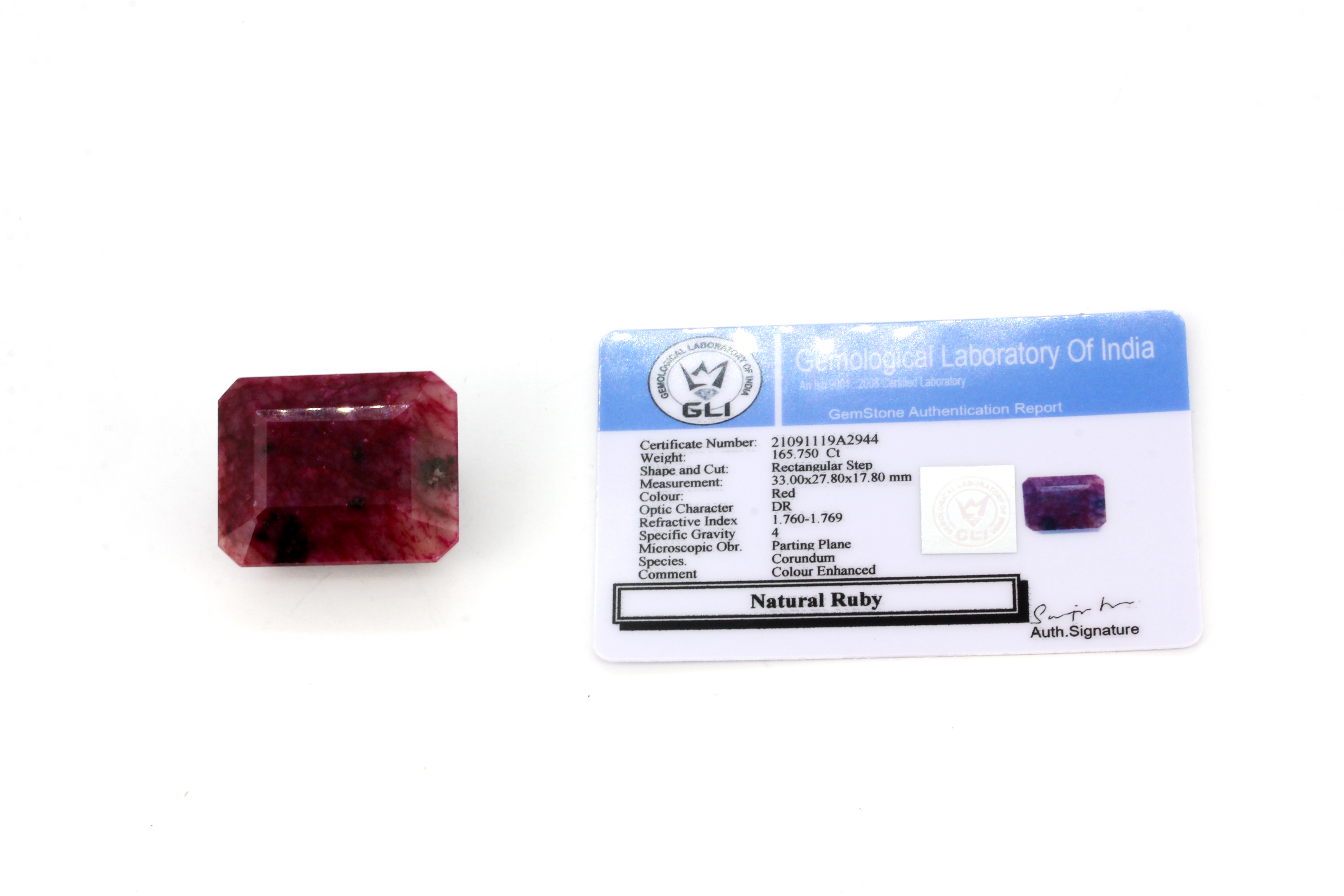 A large unmounted rectangle step cut natural ruby, approx. 165.75ct. GLI certified.