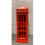 A painted wooden telephone box cabinet, 18 x 52cm.