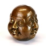 A Chinese bronze four faced Putai paperweight, H. 12cm.
