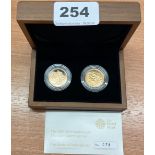 A boxed 2009 two coin sovereign set.