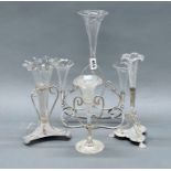 A group of four silver plate and glass epergnes, tallest H. 38cm.