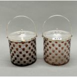 Two silver plate and cut glass biscuit barrels, H. 21cm.