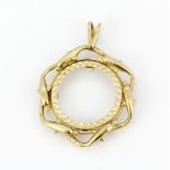 A hallmarked 9ct yellow gold pendant. A/F.