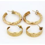Two pairs of 9ct yellow gold hoop earrings.