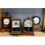 Four antique mantle clocks.
