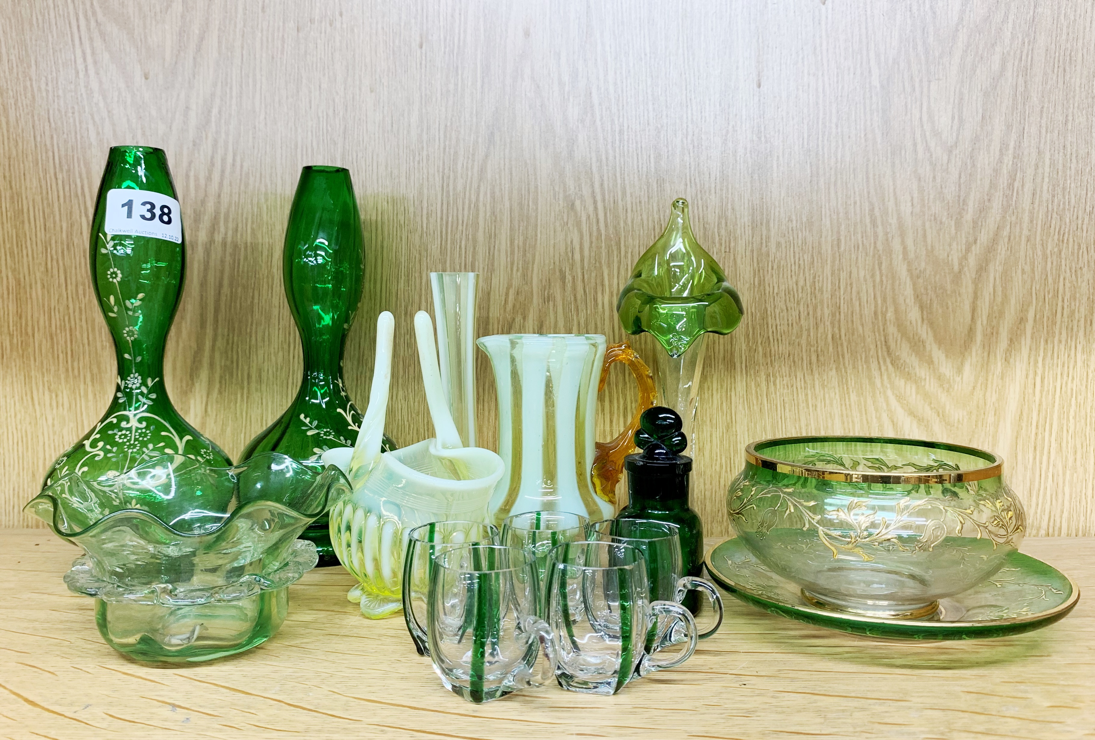 A good group of 19th and early 20th century green glassware, tallest 21cm.