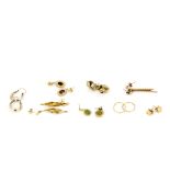 A quantity of mixed 9ct gold and yellow metal earrings.