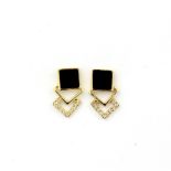 A pair of 9ct yellow gold earrings set with onyx and diamonds, L. 1.3cm.