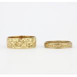 Two hallmarked 9ct yellow gold wedding bands, (O & S).