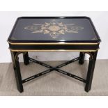 An oriental style black lacquered table, 68 x 46 x 56cm.