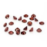 A quantity of unmounted natural round cut garnets, approx. 30.85ct total.