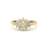 A hallmarked 9ct yellow gold diamond set cluster ring, approx. 0.80ct total, (R.5).