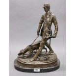 A superb signed bronze figure of a game keeper with his dog after Aldo Viteleh on a marble base,