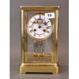A gilt brass four glass mercury pendulum striking mantle clock, H. 27cm.