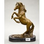A bronze figure of a rearing horse on a marble base, H. 33cm