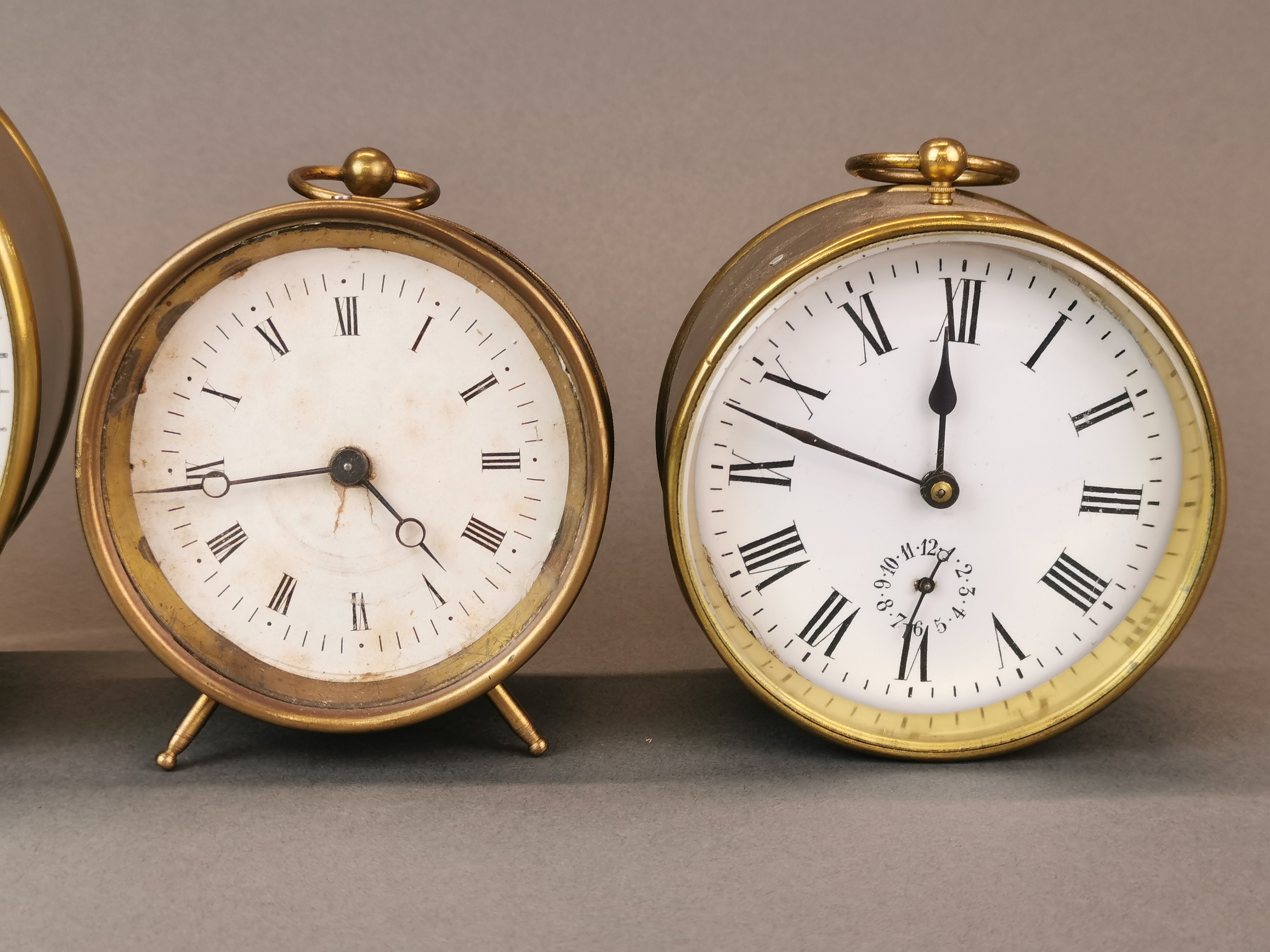 A group of four brass alarm clocks, largest Dia. 14cm. - Image 3 of 6