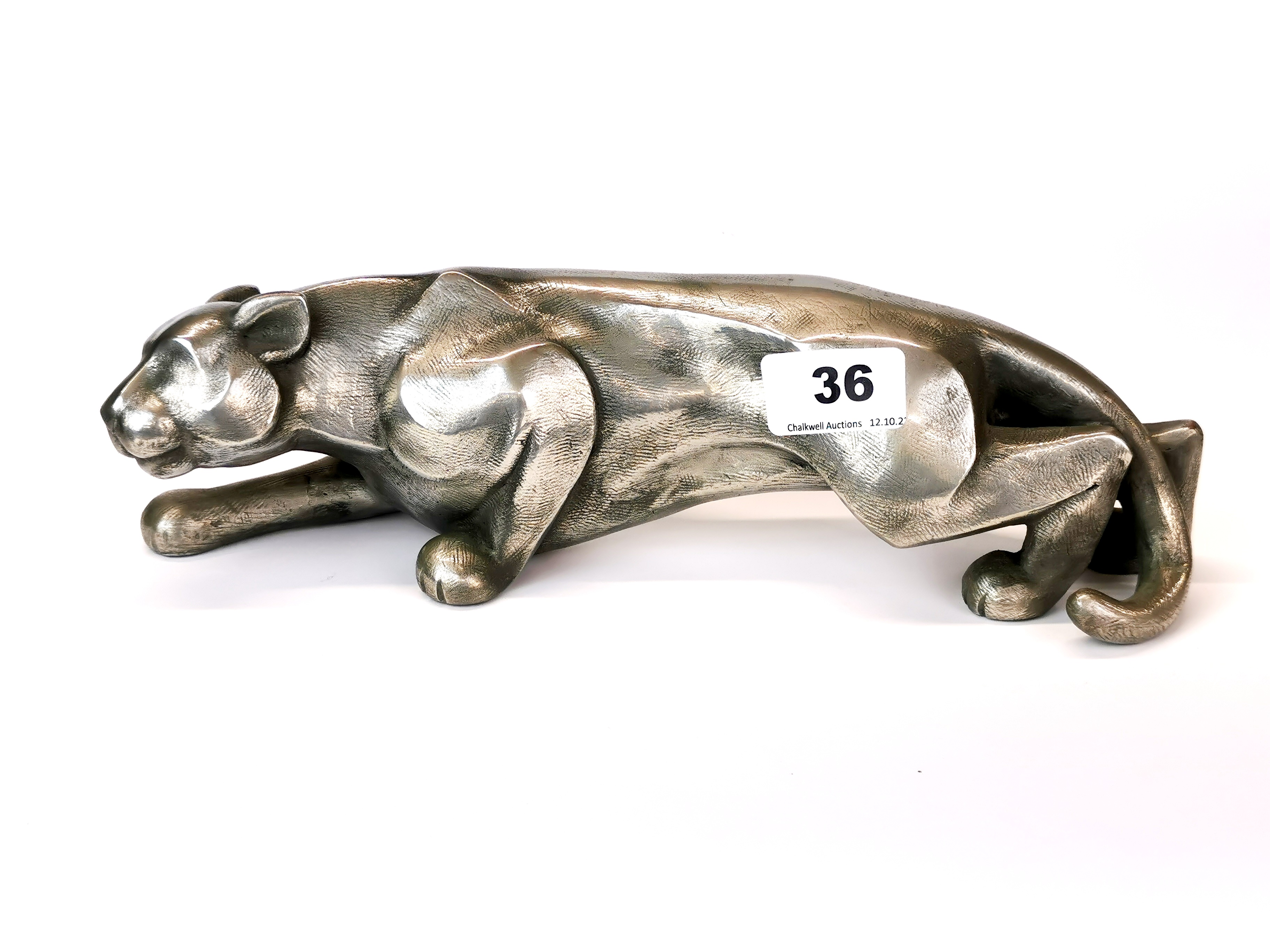 A stylish cold cast metal figure of a panther, L. 29cm.
