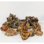 A group of Chinese carved soapstone desk water holders.