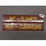 Two rare mid-20th century South African segregation railway carriage enamelled metal signs, L.