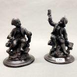 A pair of 19th century spelter figures of children on stained oak bases, H. 21cm.