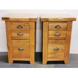 A pair of heavy quality oak three drawer chests, W. 45, H. 70cm.