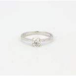 A 9ct white gold solitaire ring set with a brilliant cut diamond, approx. 0.50ct, (O.5).