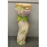 A porcelain jardiniere on stand, H. 95cm.