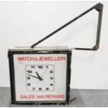 A large vintage exterior shop advertising clock, clock size 65 x 62 x 27cm.