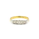 An 18ct yellow and white gold diamond set ring, (S.5).