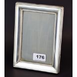 A hallmarked silver photo frame, frame size 14 x 19cm.