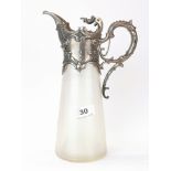 An Art Nouveau glass and silver plate topped claret/water jug, H. 28cm.