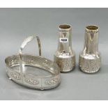A pair of Art Nouveau silver plated vases, H. 20cm, with a silver plated glass lined basket.