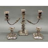 A silver plated candelabrum and a pair of candlesticks, H. 28cm.