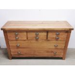 A heavy quality oak eight drawer chest, 150 x 50 x 90cm.