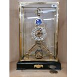 A superb gilt brass cased moonphase skeleton clock, H. 51cm. W. 34cm.