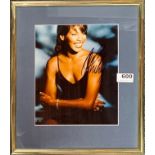 Autograph interest: A framed signed autograph photograph of Whitney Houston.