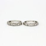 Two 925 silver rings set with round and baguette cut cubic zirconias, (M).