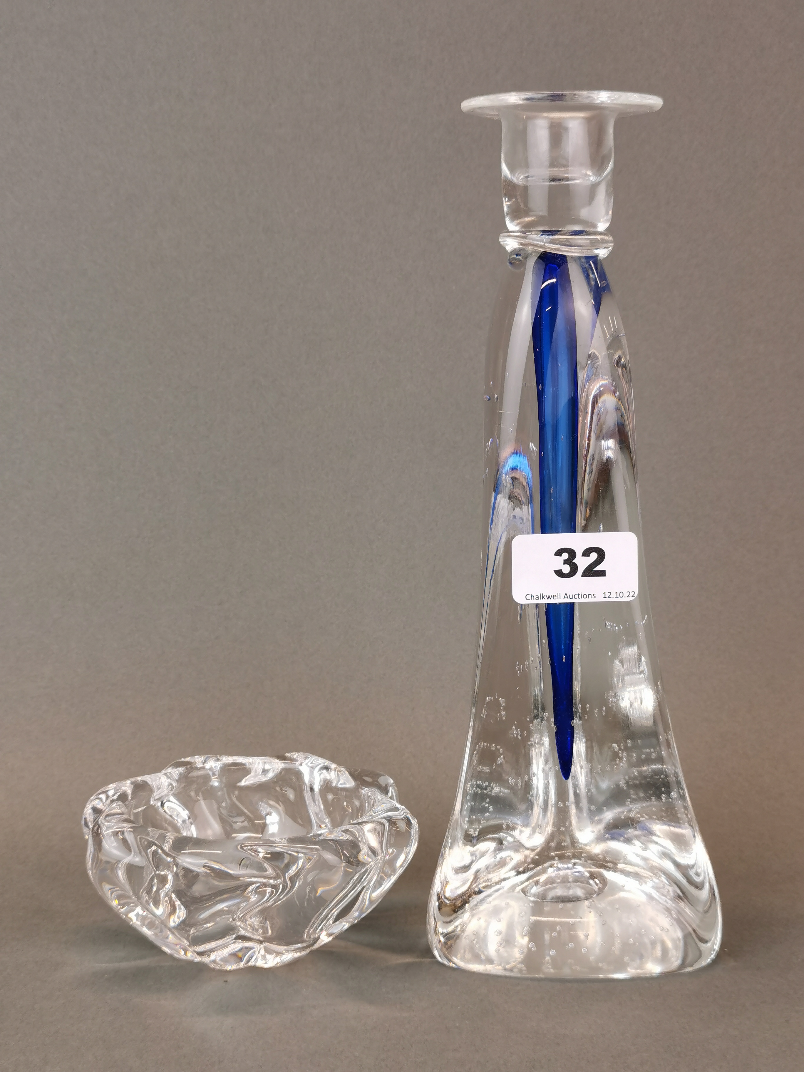 An Adam Jablonski Polish art glass candlestick, H. 26cm. Together with a signed Daum crystal bowl.