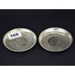 A pair of Chinese white metal dishes, Dia. 9cm.