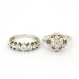 Two 925 silver rings set with round cut cubic zirconias, (N).