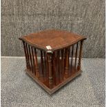 A pretty table top revolving mahogany bookcase, 34 x 34 x 33cm.