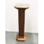 A walnut veneered pedestal, H. 90cm.