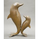 A large bronze figure of two dolphins, H. 47.