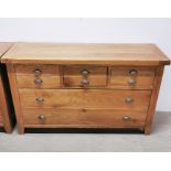 A heavy quality oak eight drawer chest, 150 x 50 x 90cm.