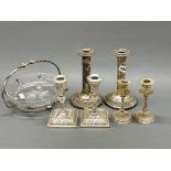 Three pairs of silver plated candlesticks, tallest H. 20cm, and a silver plate and cut glass