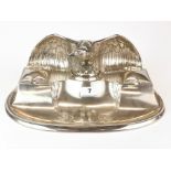 A superb early 20th century silver plated desk stand mounted with an eagle, W. 35cm.