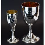 A large hallmarked silver presentation cup, H. 22cm. together with a Continental silver trophy (