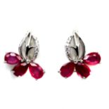 A pair of 925 silver earrings set with marquise cut rubies and white stones, L. 1.5cm.