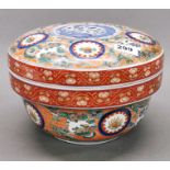 An impressive large Chinese Imari box and cover, Dia. 27cm. H. 20cm.