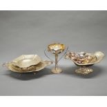 An Art Nouveau silver plated vase and four silver plated bowls.